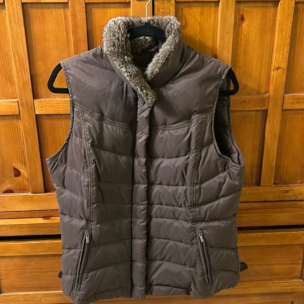 Excellent condition. Eddie Bauer down jacket. Brown with faux fur on collar.